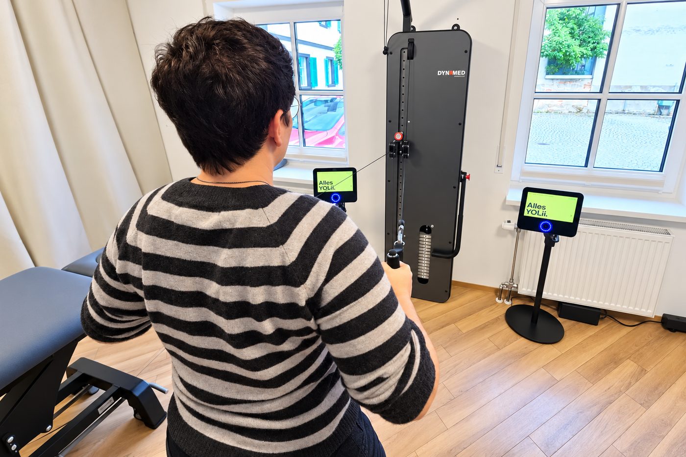 Training am Kabelzug im Trainingsbereich der Praxis